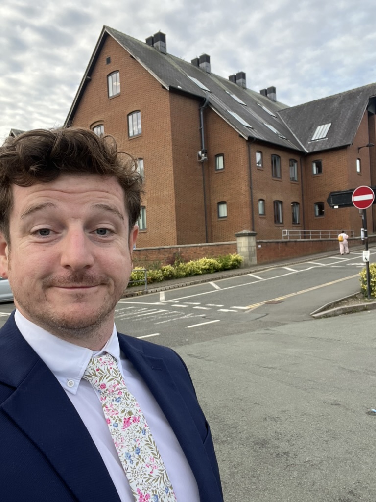Neil Bentley standing outside a Shropshire Council building