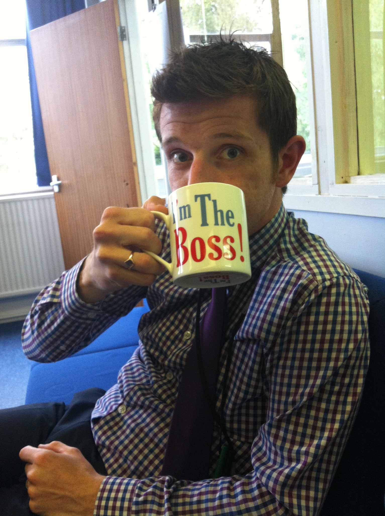 Neil Bentley during his teaching years, holding a mug